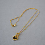 Black and White Heart Pendant Necklace in Gold