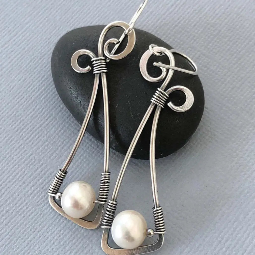 Vintage pearl earrings in silver