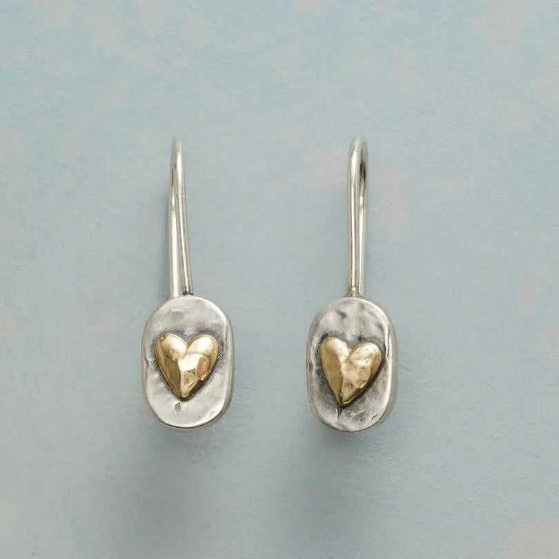 Golden heart earrings in vintage silver