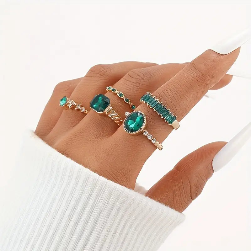 Zarina Elegant Emerald Gold Ring Collection