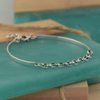 Above the Curve Bracelet