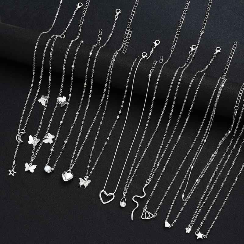 12-Piece Heart Butterfly Star Moon Snake Water Drill Pendant Necklace Set