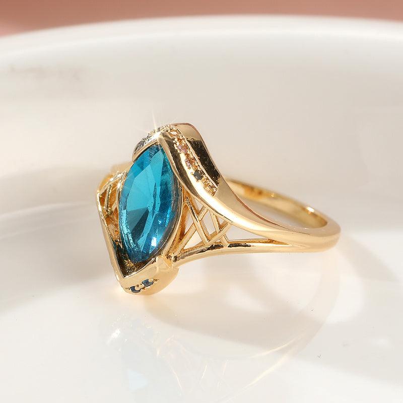 Vintage Teardrop Crystal Ring with Marquise Accents - Gold Plated Band