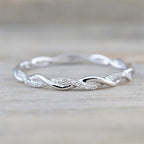 Braided Ring with Zircons in Gold and Silver