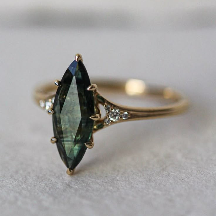 Oval Green Stone Gold Ring